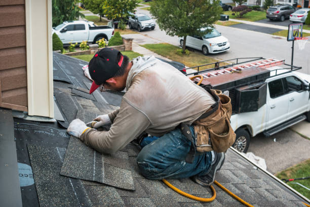 Professional Metal Roofing technician working in Bedford, MA
